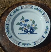 A Polychrome Delft Charger.