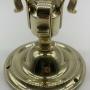 An Edwardian brass ceiling rose with triple hook