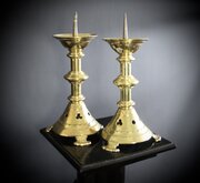 A Pair Of Gothic Brass Candlesticks 