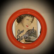 Vintage 1970s Orange Round Plastic Mirror