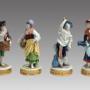 Group of four sculptures in Capodimonte porcelain.