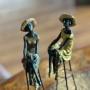 A Fine Pair of Patinated Bronze Seated Ladies