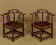 Pair Of Carved Oak Corner Chairs C.1890