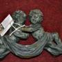 cast metal  putti