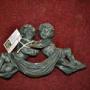 Metal Mount Modelled As Embracing Putti, C1850