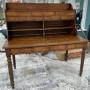 Early Victorian oak desk with shelved top section