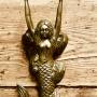A Brass Door Knocker in the Shape of a Mermaid