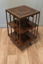 A Carved 2 Shelf Revolving Oak Bookcase 