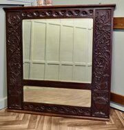 A Large Carved Oak Wall Mirror