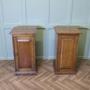 A Pair of Arts and Crafts Oak Bedside Cupboards