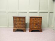 A Pair Of Walnut Bedside Chest Of Drawers