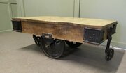 A Unique Wood Framed Industrial Coffee Table 