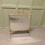 An Art Deco Brass and Sunburst Mirror Fire Screen