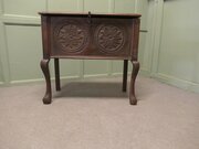 An Unusual Carved Oak Coffer On Legs 