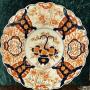 A large Imari charger, circa 1900-1920