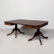 A Regency Mahogany Twin Pillar Dining Table 
