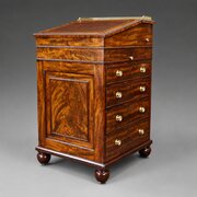 A fine Gillows flame mahogany Davenport