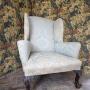 Antique Upholstered Wing Chair