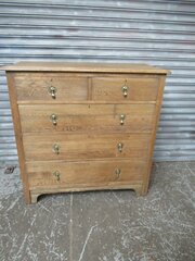 A 1920s Light Oak Five Drawer Chest.