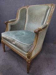 Antique French Carved Walnut Bergere Armchair.