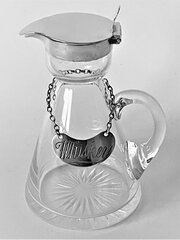 An Edwardian Silver Mounted Whisky Tot & Label