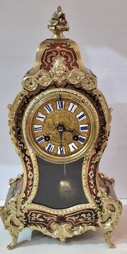 A Boulle Inlaid Mantel Clock