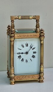 A Decorative Cased Carriage Clock
