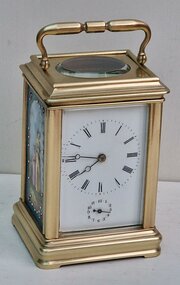 A Porcelain Panel Carriage Clock