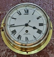 A Smiths Enamel Dial Ships Clock