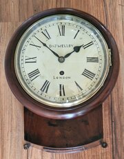 A small 8 Dial Wall Clock DJ Wellby London