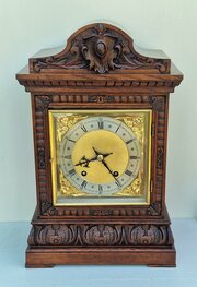 W&H Carved Oak Mantel Clock