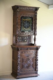 Carved Oak Continental Cabinet