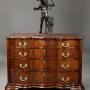 18thc Continental mahogany commode of oxbow form
