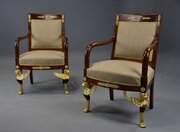 Pair of French Empire style mahogany fauteuils