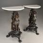 Pair of finely carved Black Forest hound tables