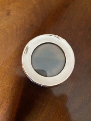 A Round Silver Photo Frame
