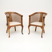 Pair Of Antique Edwardian Walnut Cane Armchairs