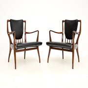 Pair Of Rosewood And Leather Armchairs By Heals