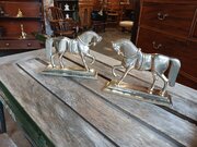Pair Of 19th Century Brass Door Stops.