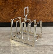 An Art Deco Period Arched Silver Toast Rack