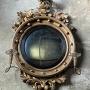 A Regency Giltwood Girandole Convex Wall Mirror