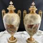Royal Worcester pair of vases signed John Stinton.