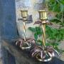 Pair of Arts & Crafts copper and brass candlestick