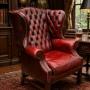 Large George III style leather wing armchair 