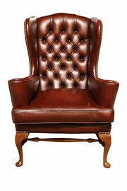 A Vintage Burgundy Leather Wingback Armchair circ