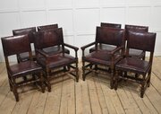 Eight Leather Upholstered Oak Dining Chairs