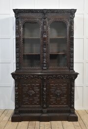 Renaissance Revival Carved Oak Two Door Bookcase