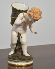 Royal Worcester Porcelain Figure – Cherub With Basket