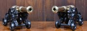 pair of cast iron and brass signal cannons Pair Of Cast Iron And Brass Signal Cannons