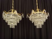 Pair Of Matching 4 Tier Swagged Chandeliers